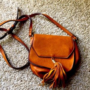 Sling back with tassel